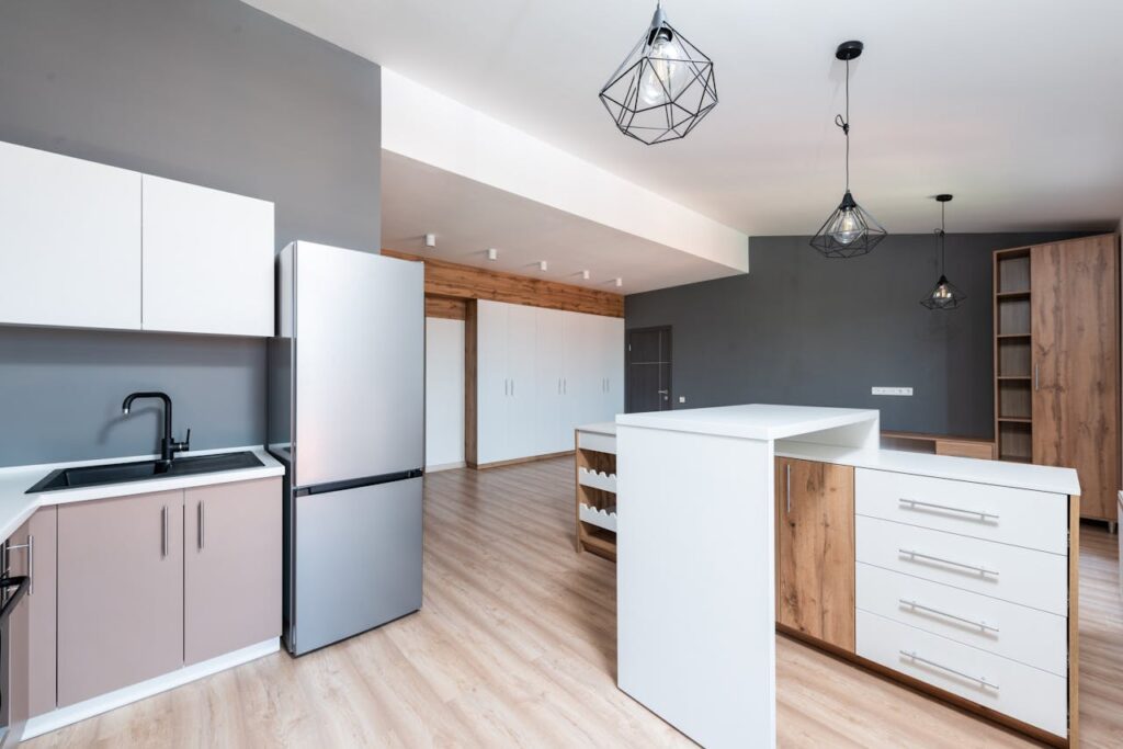 Spacious modern kitchen with minimalist design and elegant fixtures.